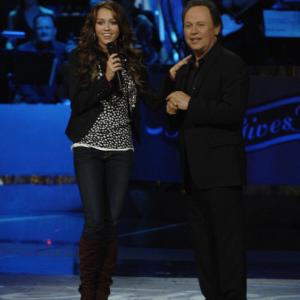 Still of Billy Crystal and Miley Cyrus in American Idol: The Search for a Superstar (2002)