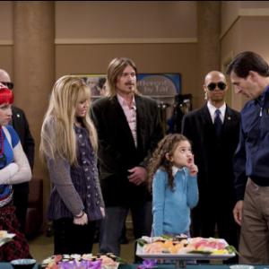 Still of Billy Ray Cyrus Emily Osment Miley Cyrus and Madison Pettis in Hannah Montana 2006