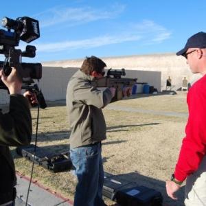 Executive Producer of Outdoor Channel Lloyd Bryan Adams takes aim in Shot Show Special
