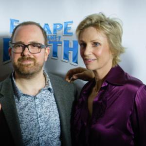 Cal Brunker Jane Lynch and Bob Barlen at the Hollywood premiere of Escape From Planet Earth