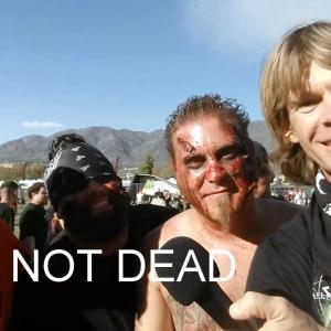 Gregory Graham aka Heavy Metal Greg interviewing the band Still Not Dead at the 2015 Knotfest.