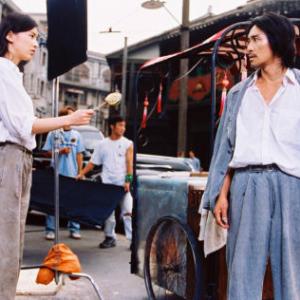 Left: Huang Sheng Yi as Fong; Right: Filmmaker Stephen Chow as Sing