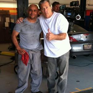 Marco Draven with Rob Pritts on the set of AAMCO Commercial
