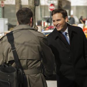 Peter Facinelli as Peter Decker greets Ian Lyons as Don Fenton in NBC's AMERICAN ODYSSEY