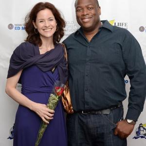 Ally Sheedy and Michael J Arbouet on the red carpet at the Long Island International Film Expo