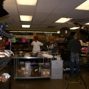 Evan Boymel, Shawn Baird and crew in the bakery on the set of 