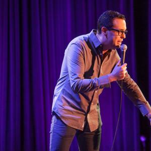 Joe DeRosa on stage at SXSW in 2015 for SXSW Comedy with W Kamau Bell