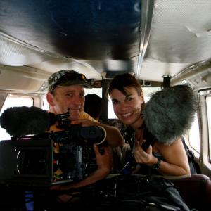 Melanie and cameraman Max on a plane into the Amazon jungle in 2007 to film documentary Tribal Wives for the BBC