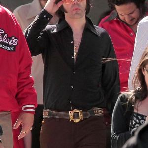 Sara Geralds Script Supervisor was barely caught in this paparazzi shot of Ron Livingston playing Elvis on the set of Shangri La Suite