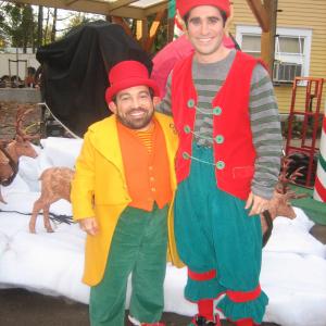 Ben Giroux with Danny Woodburn on set for Disneys Santa Buddies