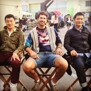 Brian Thomas Smith on set with Dawei Tong and Xiaoming Huang in the Chinese blockbuster movie Hollywood Adventures BTS is huge in China