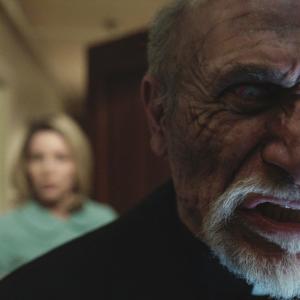 Still of Tony Amendola and Annabelle Wallis in Anabele 2014