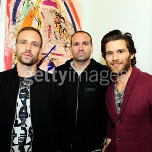 Caption: LOS ANGELES, CA - FEBRUARY 17: Nick Blood, Danny Minnick and Johnny Whitworth attend the 8th Annual Pieces of Heaven Art Auction Presented by Samsung Galaxy at MAMA Gallery on February 17, 2015 in Los Angeles, California.