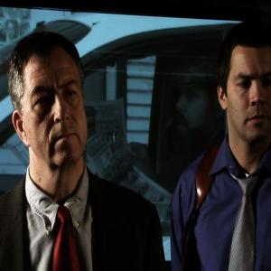 Mark Nilsson (right) as Agent Chase in 4 and a Half Terrorists