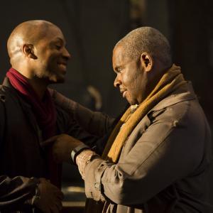 Devin E. Haqq and Ron Simons in Ambition's Debt