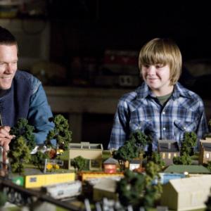 Still of Kevin Bacon and Miles Heizer in Rails & Ties (2007)