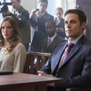 Still of Katie Cassidy and Dylan Bruce in Strele 2012