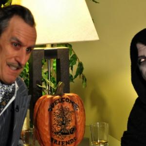 As Vincent Price chillin with the Grim Reaper during the filming of Ask Grim