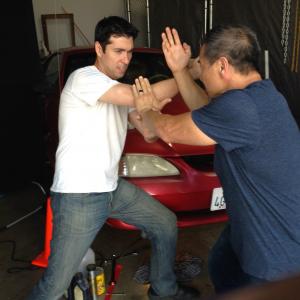 Jin Kelley and James Lew getting down on the set of The Art of Fighting
