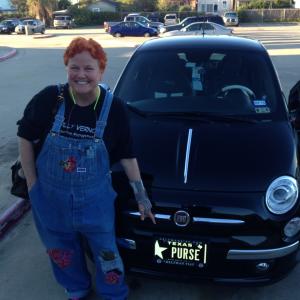 Molly with her GUCCI FIAT and vanity plate purse Every 1st AD should have one!