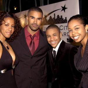 Temple Poteat, Shemar Moore, Tequan Richmond and publicist, Laura Wright attend the 14th Annual Inner City Youth Awards in Los Angeles, California.