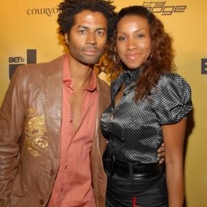 Eric Benet and Temple Poteat on red carpet at BET Fall Launch Party.