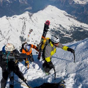 Jim Surette shoots Stian Hagen and Chris Davenport near the summit of the Eiger, Switzerland