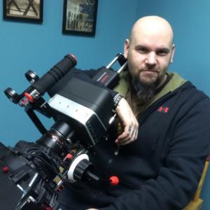 Director Matt Busch with the primary camera used for shooting ALADDIN 3477 the Black Magic Cinema 4K Production Camera