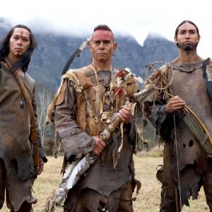 Official first look press photo from Sony National Geographic's SAINTS & STRANGERS. Tatanka Means as Hobbamock with Raoul Trujillo and Kalani Queypo