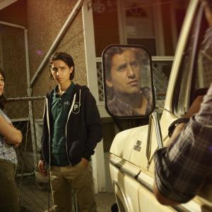 Still of Cliff Curtis Elizabeth Rodriguez and Lorenzo James Henrie in Fear the Walking Dead 2015