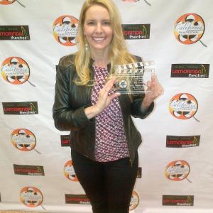 Linda Kruse Producer accepting the Best Screenplay Award for WriterDirector Jonathan Bucaris boyhood adventure feature screenplay Maxs Fantastic Adventures at the California Independent Film Festival