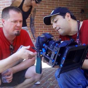 Chris King with Director of Photography John Alexander Jimenez on the set of Happiness