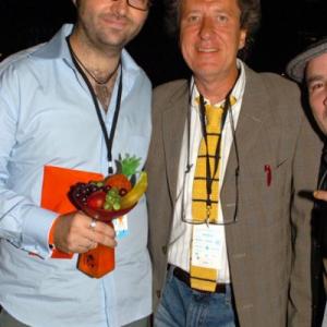 Luke Eve receiving the Best Film trophy from Geoffrey Rush at Tropfest 2005