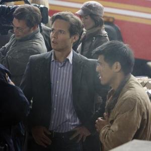 Still of Scott Wolf and Nelson Wong in V (2009)