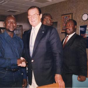 Goodwill Ambassador Roger Moore and Jojo Robertson in Ghana 2000