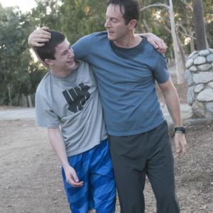 Still of Jason Isaacs and Dylan Minnette in Awake 2012