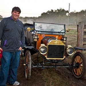 Arthur L. Bernstein with a 1913 car