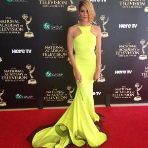 Tiffany Michelle attends the 41st Annual Daytime Emmy Awards with the nominated cast of DeVanity, wearing an MT Costello gown by Michael Costello.