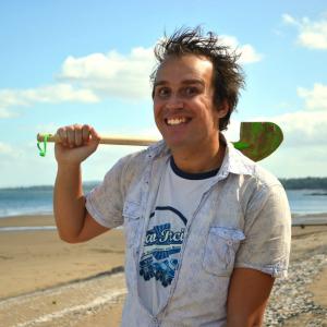 Shawn Watson poses for a photograph while on location at Hound Point Beach
