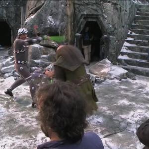 Behind the scenes, Michael M. Foster, as an Orc fighting Dwalin (Graham McTavish) in The Hobbit: Battle of the Five Armies. Watching on are stunt coordinators Tim Wong (back) Glenn Boswell (front) with Peter Jackson and crew
