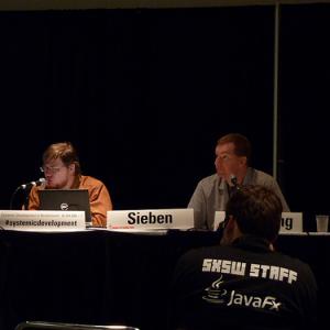 Matthew Armstrong and Jimmy Sieben giving a presentation on Borderlands as SXSW in 2010