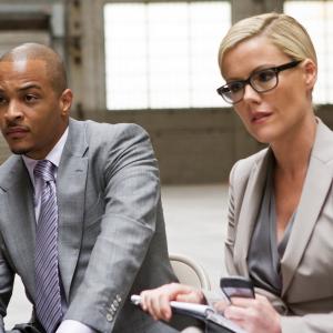 Still of Kathleen Robertson and T.I. in Boss (2011)