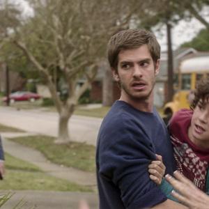 Still of Michael Shannon Andrew Garfield and Noah Lomax in 99 Homes 2014