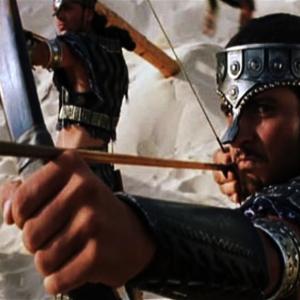 Shero Rauf as a Trojan Archer facing Brad Pitt in 3 Close ups in the movie Troy 2004