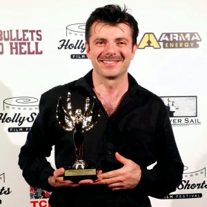 Fernando receiving the AUDIENCE AWARD at the Chinese Theater in Hollywood for Doradus Hollyshorts Film Festival winner 2014