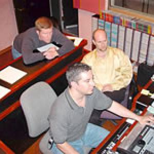 Kevin Kachin Rich Celenza and Dean Pompinio in editing suite reviewing Insanity footage
