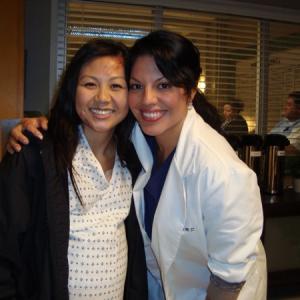 on set of Grey's Anatomy with Sara Ramirez
