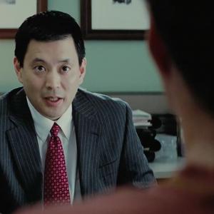 (l to r) Scott Takeda as Bank Manager and Will Ferrell as Nick Halsey in the indie drama EVERYTHING MUST GO, a Lionsgate release.