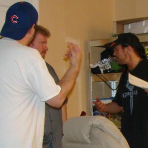 Wahlin talks with cast and crew on the set of Hand of Glory