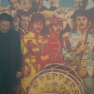 Beatles Museum Hamburgme beside John starring on an iconic cover